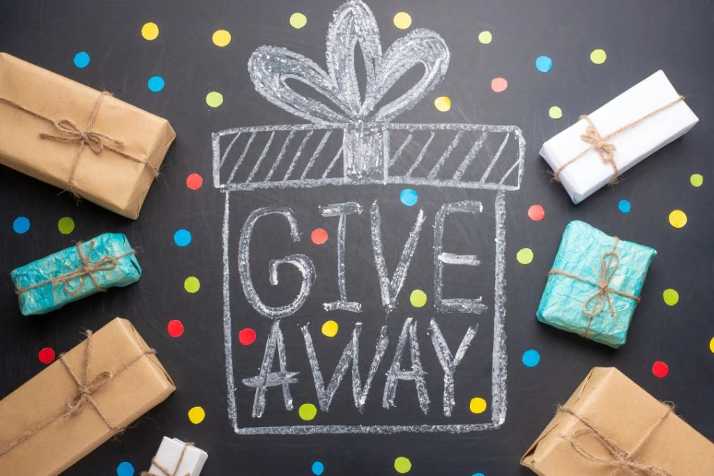 An illustration board with a drawing of a gift box with the writing "giveaway" inside the box