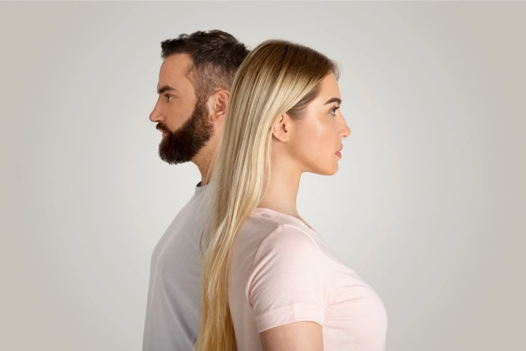 man and woman facing opposite directions