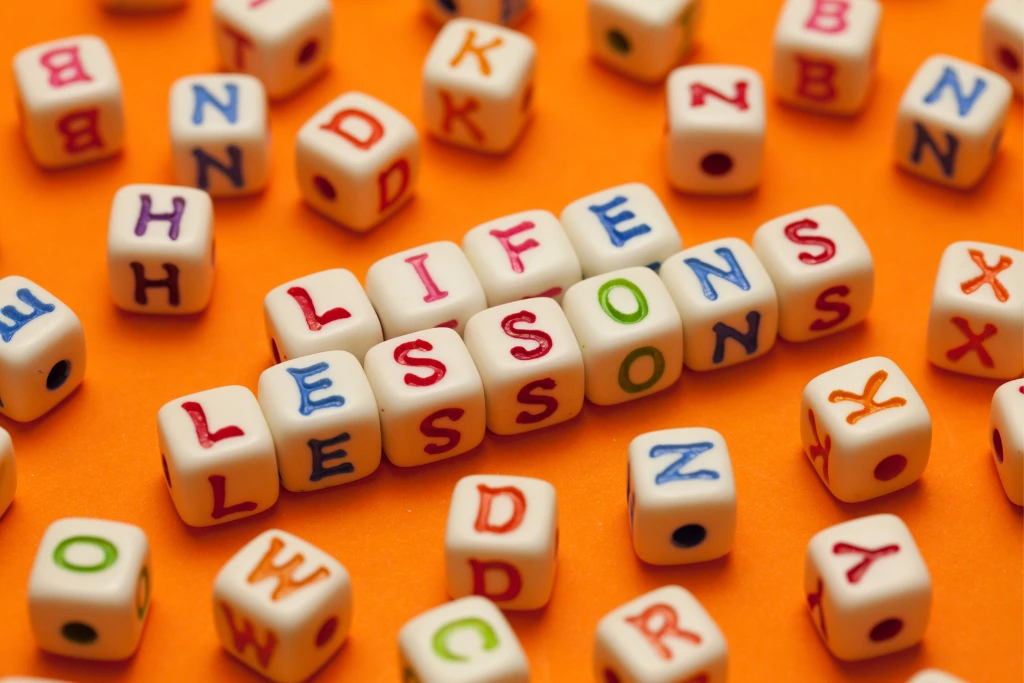 letter blocks forming the words life lessons